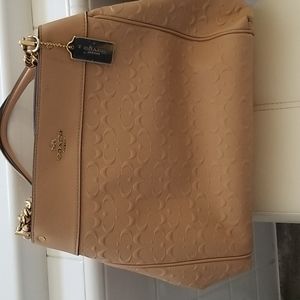 Cream Lexy and Black Brown Lexy Coach purses